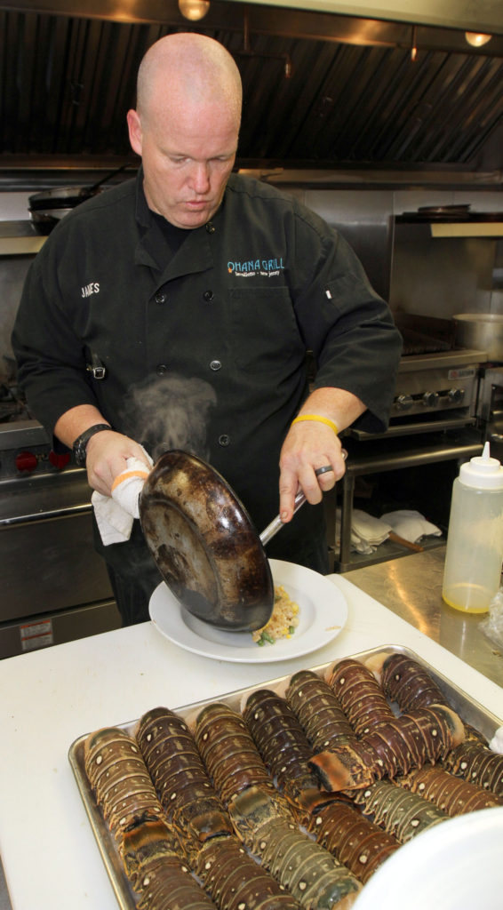 The Ohana Grill co-owner and chef James Costello works in the kithchen in the Lavallette restaurant on July 20, 2013.  PHOTO BY THOMAS P. COSTELLO